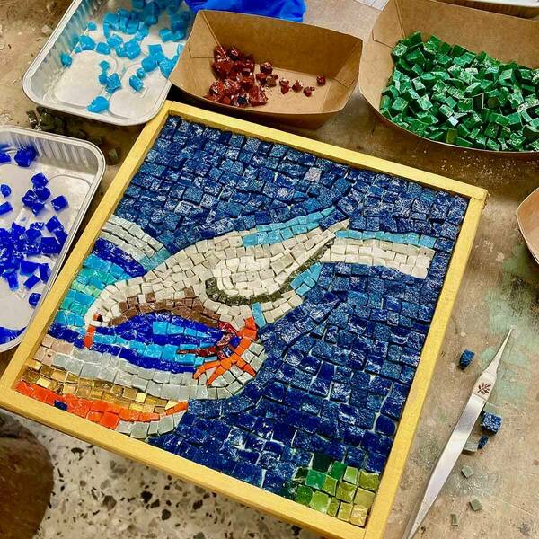 Mosaic of a dove drinking from a fountain.